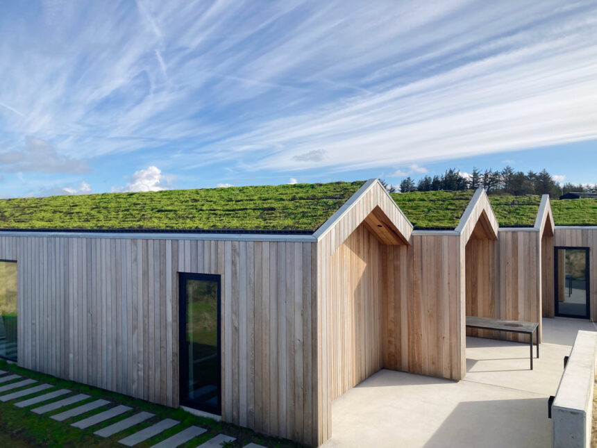 3_part-wood-house-with-Nature-roof-summer